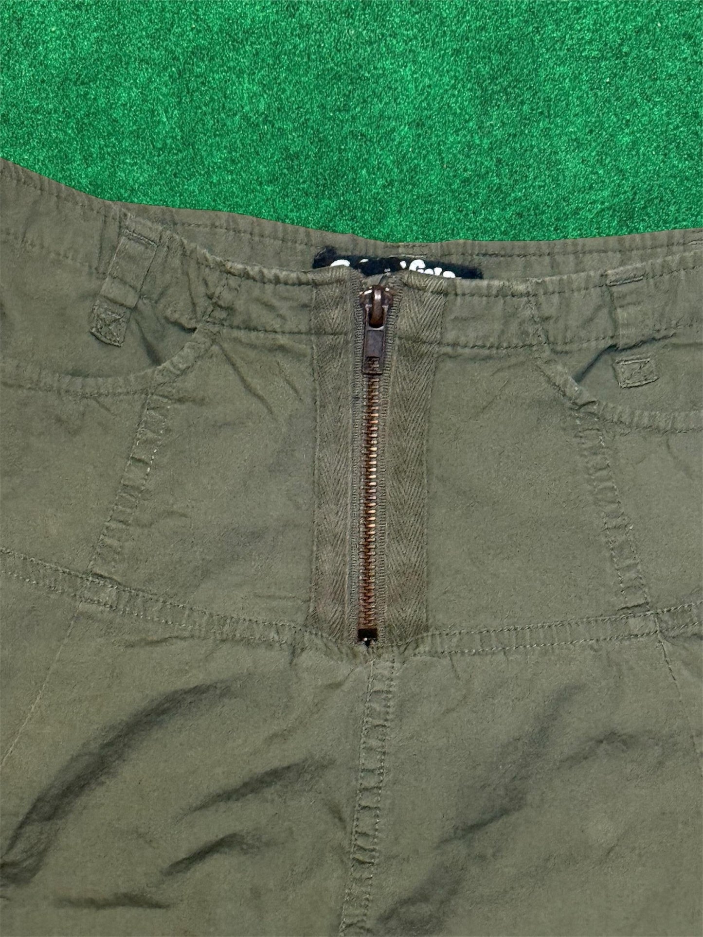 Asymmetric cargo skirt